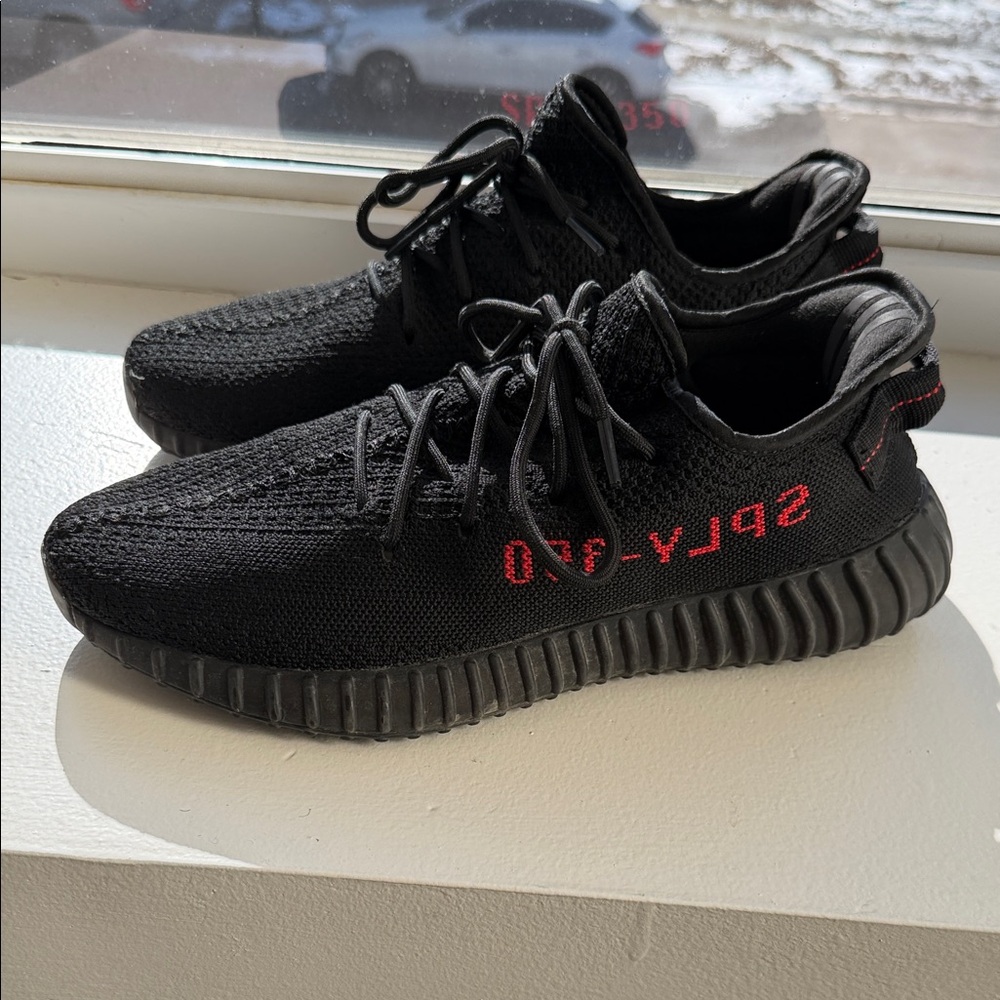 Yeezy Black Sneakers with Red Accents